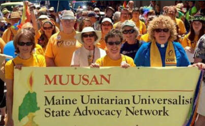 MUUSAN members holding a banner that reads "Maine Unitarian Universality State Advocacy Network"